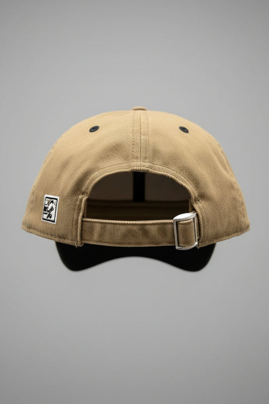 Beige cap with a logo on the back