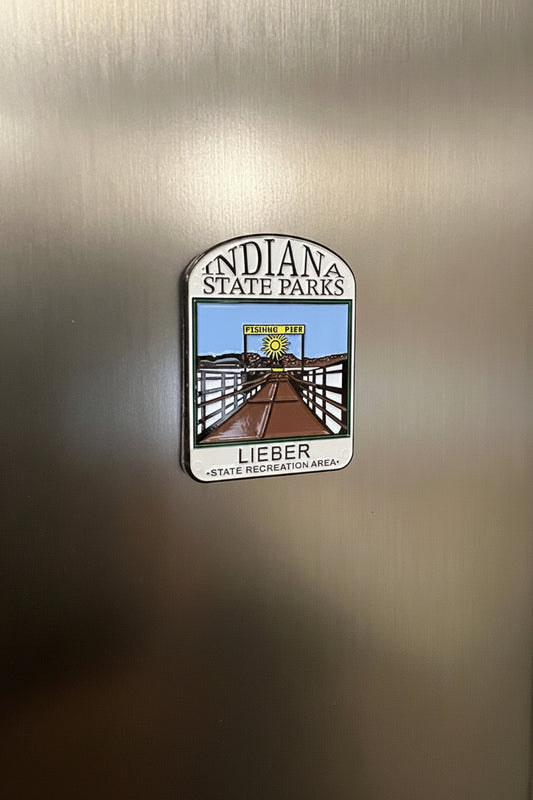 Fridge magnet with Indiana State Parks design on a metallic surface