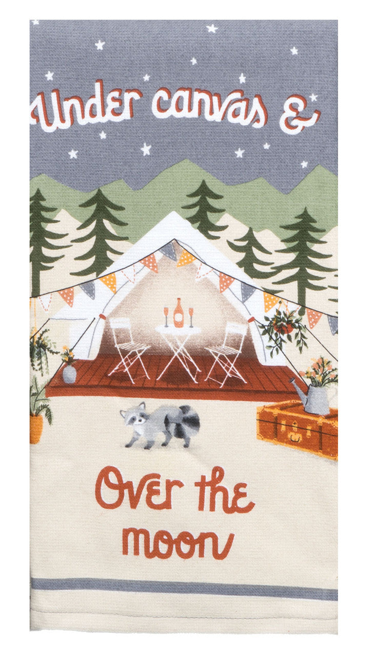Decorative towel with camping scene and a raccoon with text 'Under canvas & Over the moon' on a blue background.
