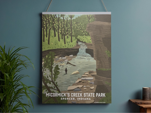 Illustration of McCormick's Creek State Park on a blue wall with a plant and small table in the foreground.
