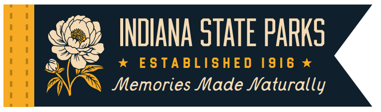 Indiana State Parks banner graphic with a dark navy blue background, cream text reading 'Indiana State Parks' and 'Memories Made Naturally,' 'Established 1916,' a cream flower illustration, and a yellow vertical stripe on the left.