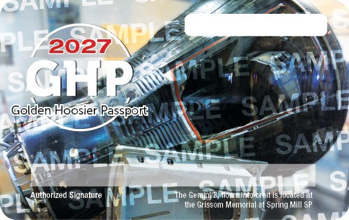 A 2027 State Parks Golden Hoosier Passport with an image of the Gemini 3 located at the Grissom Memorial at Spring Mill State Park.