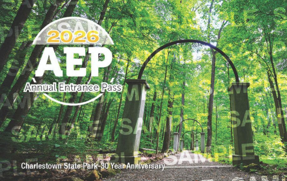 2026 Annual Entrance Pass Feature view of arches and a forest 