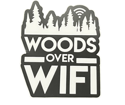 Sticker with 'Woods Over WiFi' text and forest design on a white background