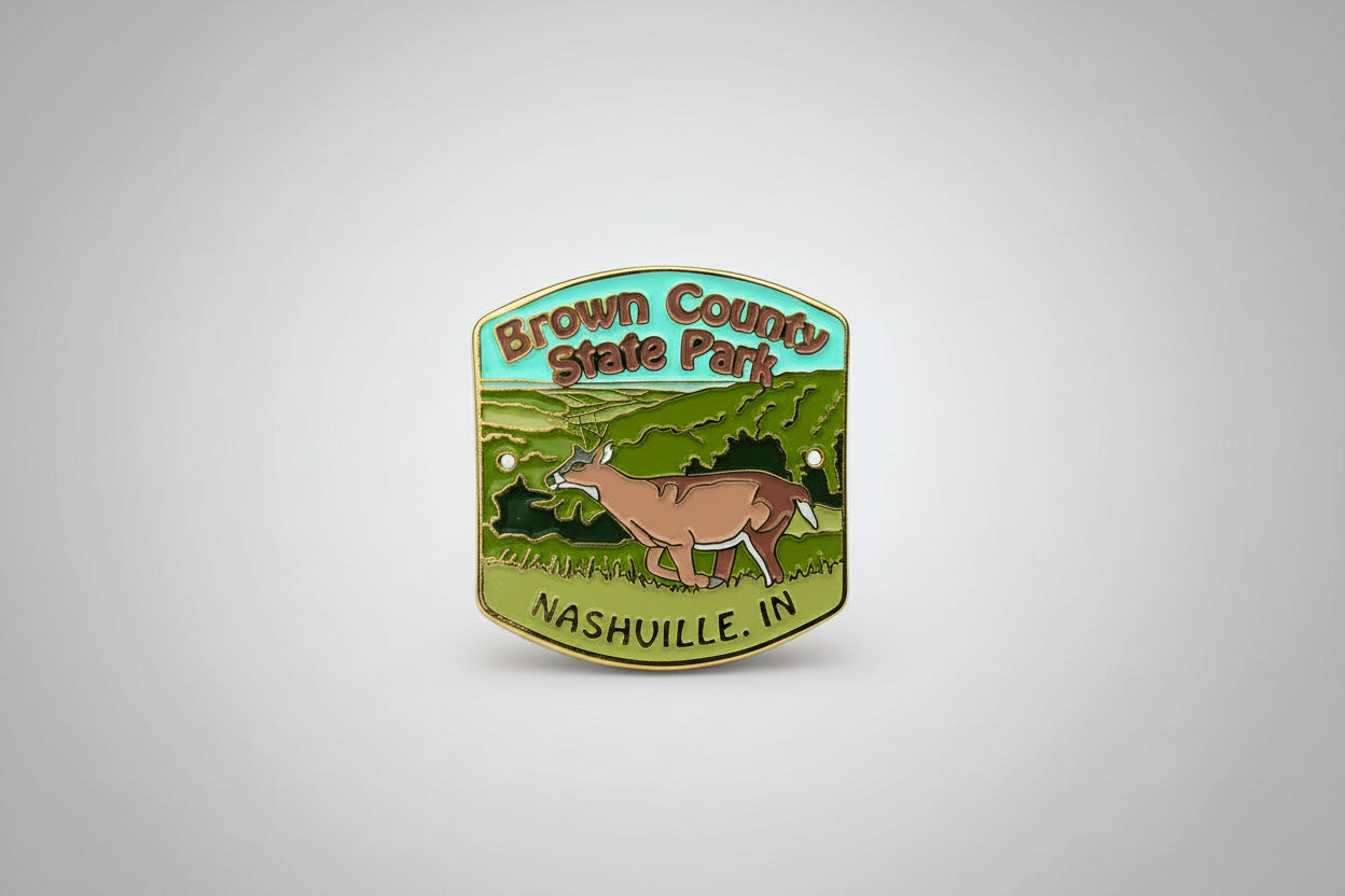 Brown County State Park hiking medallion with deer illustration on a woodland background