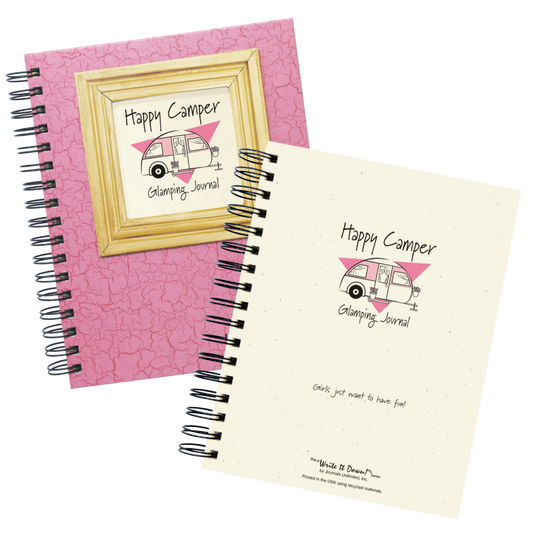 Two 'Happy Camper Glamping Journal' notebooks, one pink and one beige, with a gold frame on a white background.