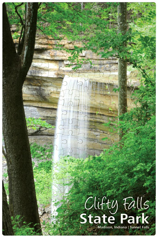 Waterfall in Clifty Falls State Park with trees and greenery