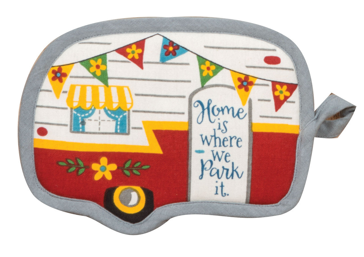 Camping-themed pot holder with a camper design and 'Home is where we park it.' text.