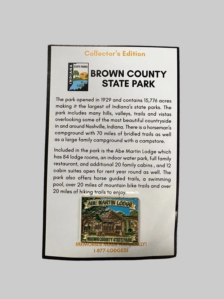 A rectangular printed informational plaque for Brown County State Park, titled 'Collector's Edition,'. The plaque has a white background with black text, orange heading text, a small park logo at top left, and a small vintage-style lodge illustration at the bottom.