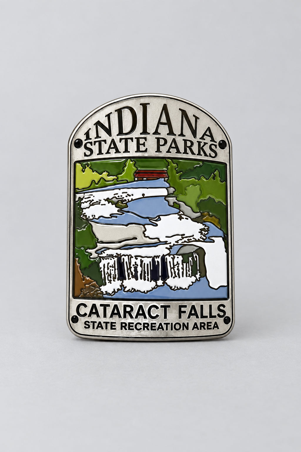 hiking medallion featuring cataract falls state recreation are with a waterfall and trees