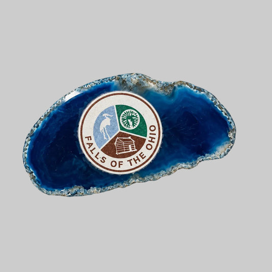 colorful agate slice magnet with the Falls of the Ohio logo on a light background.