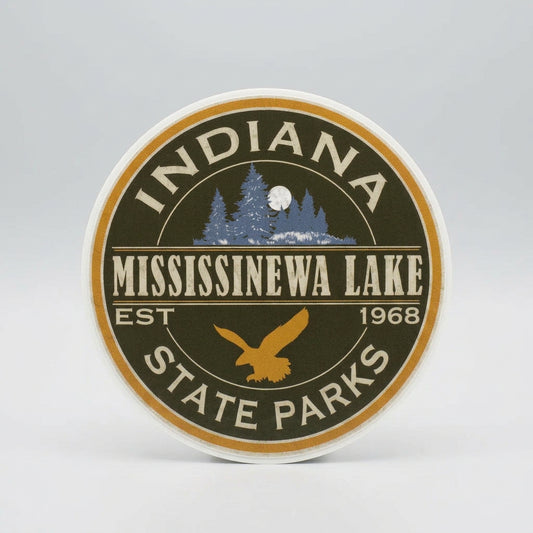 Round sticker with forest and full moon illustration, an eagle silhouette, and the text “Indiana Mississinewa Lake Est 1968 State Parks.”