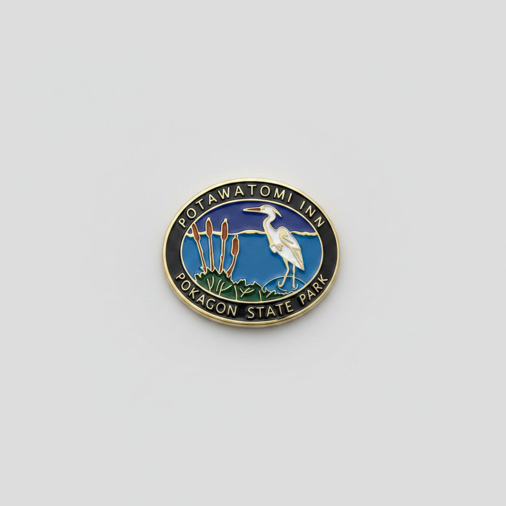 Hiking stick medallion with a heron design and 'Potawatomi Inn: Pokagon State Park'