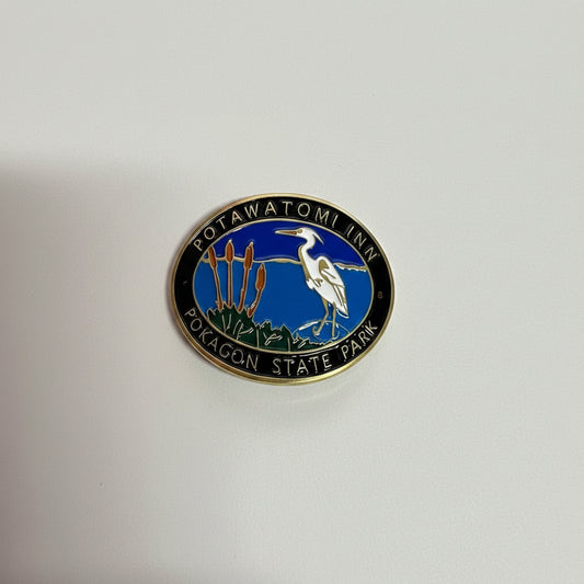 Hiking stick medallion with a heron design and 'Potawatomi Inn: Pokagon State Park'