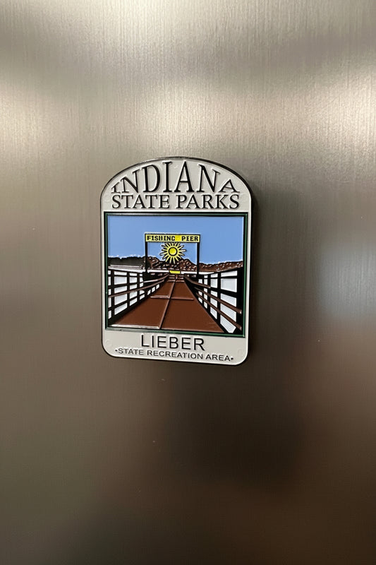 Fridge magnet with Indiana State Parks design on a metallic surface