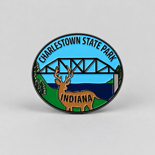 Charlestown State Park magnet with an image of a deer and a bridge in the background.
