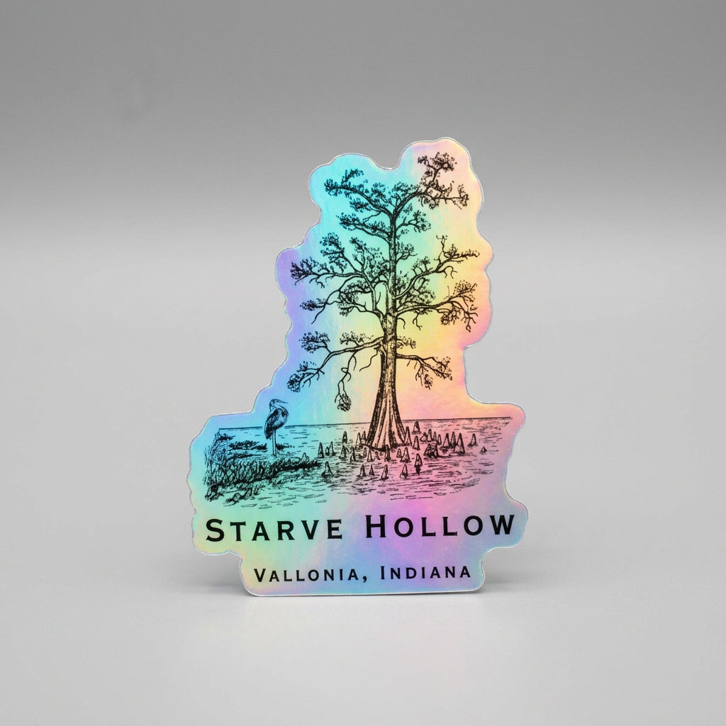 Holographic sticker shaped around an illustrated lakeside tree with surrounding water and vegetation, featuring the text “Starve Hollow” and “Vallonia, Indiana.”