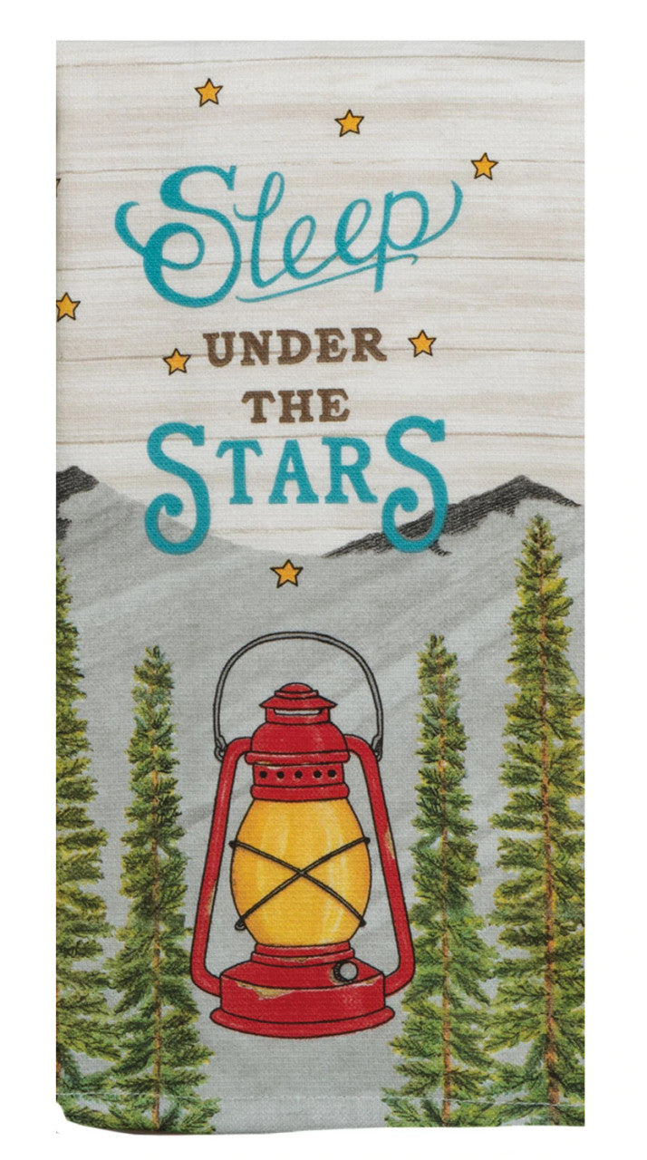 Decorative towel with 'Sleep Under the Stars' text, red lantern, forest design, and mountains on a wooden pattern background.