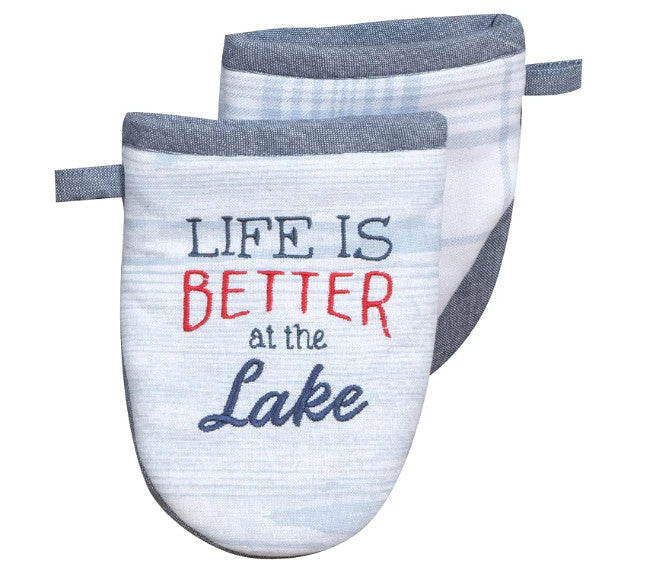 Off white and bluish grey oven mitt with 'Life is Better at the Lake' text 