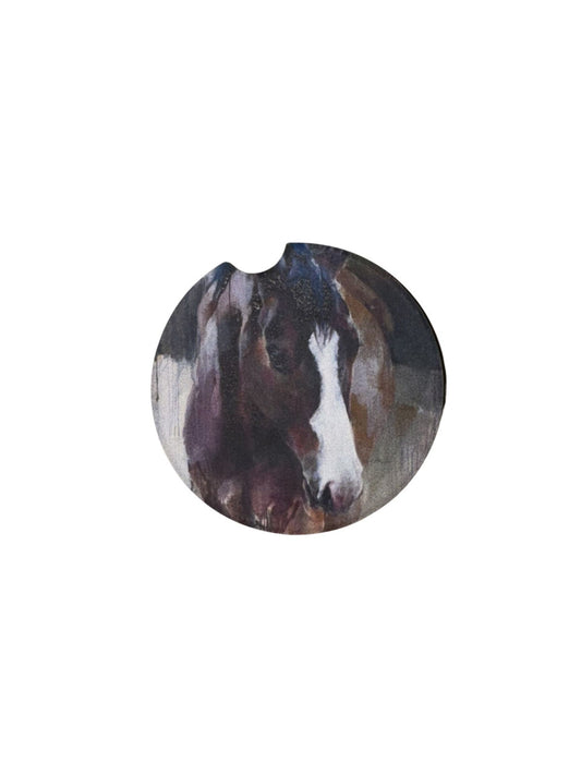 Round, stone car coaster with brown and white horse design with an indent for easier removal