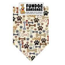 Dog bandana with paw and bone pattern on a cream colored background
