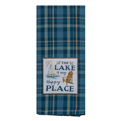 Blue plaid towel with a decorative sign featuring 'The Lake is my Happy Place' in blue text and graphics of a boat and rocking chair.