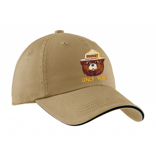 khaki colored baseball cap with smokey the bear logo on the front