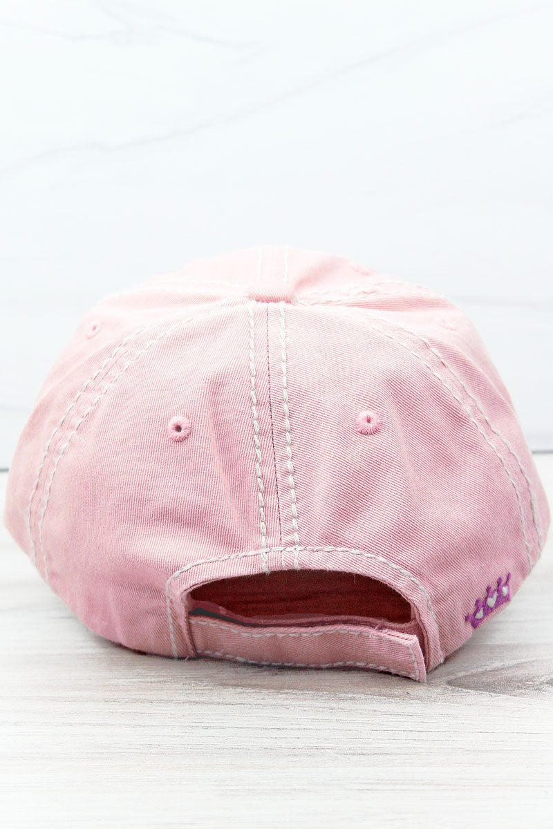 Pink baseball cap on a white background