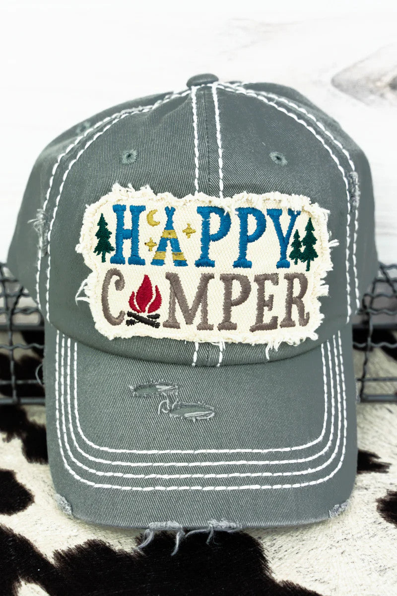 Distressed grey cap with 'Happy Camper' text and camp graphics on a patch