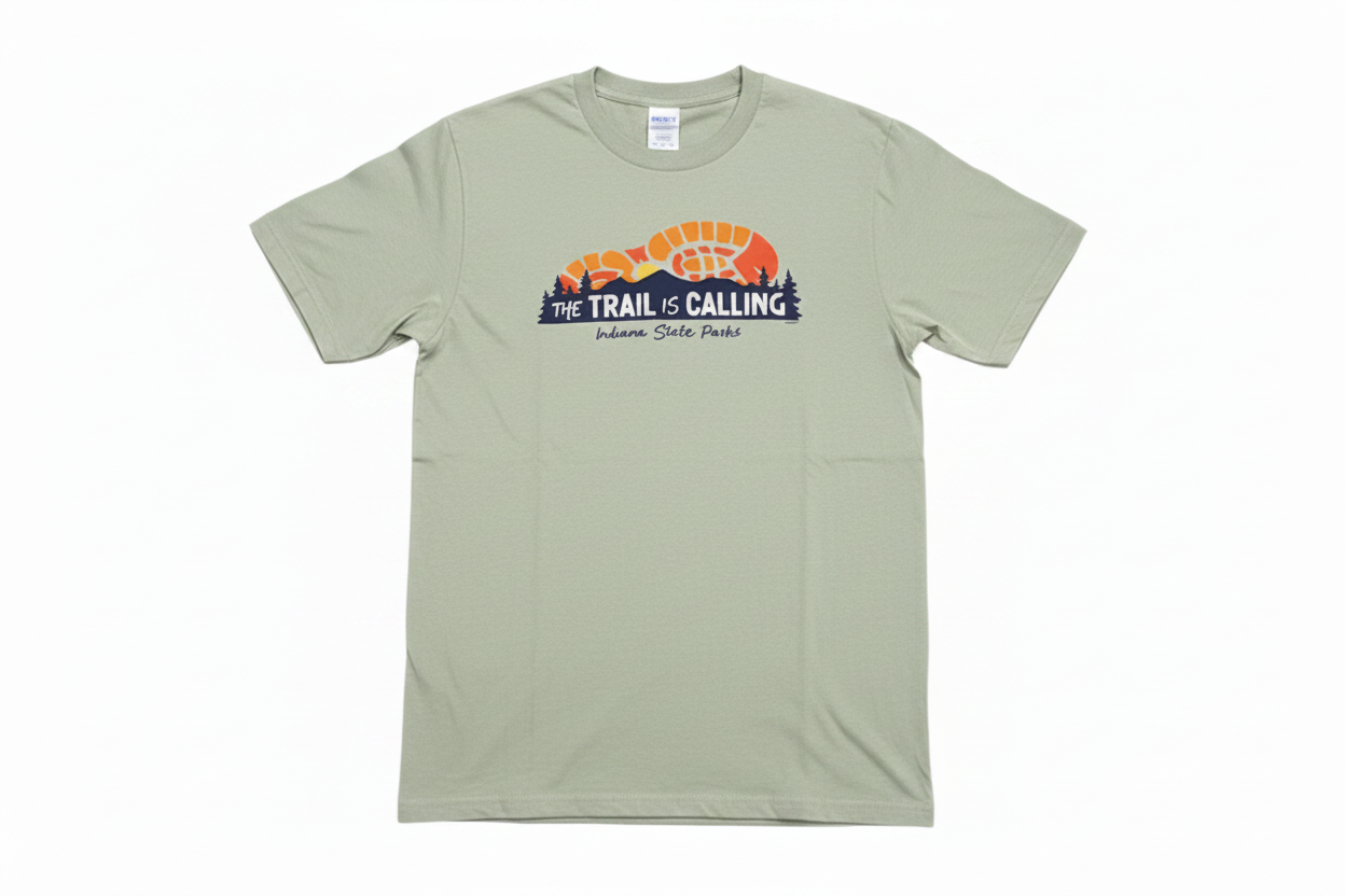 green t-shirt with graphic design on a white background